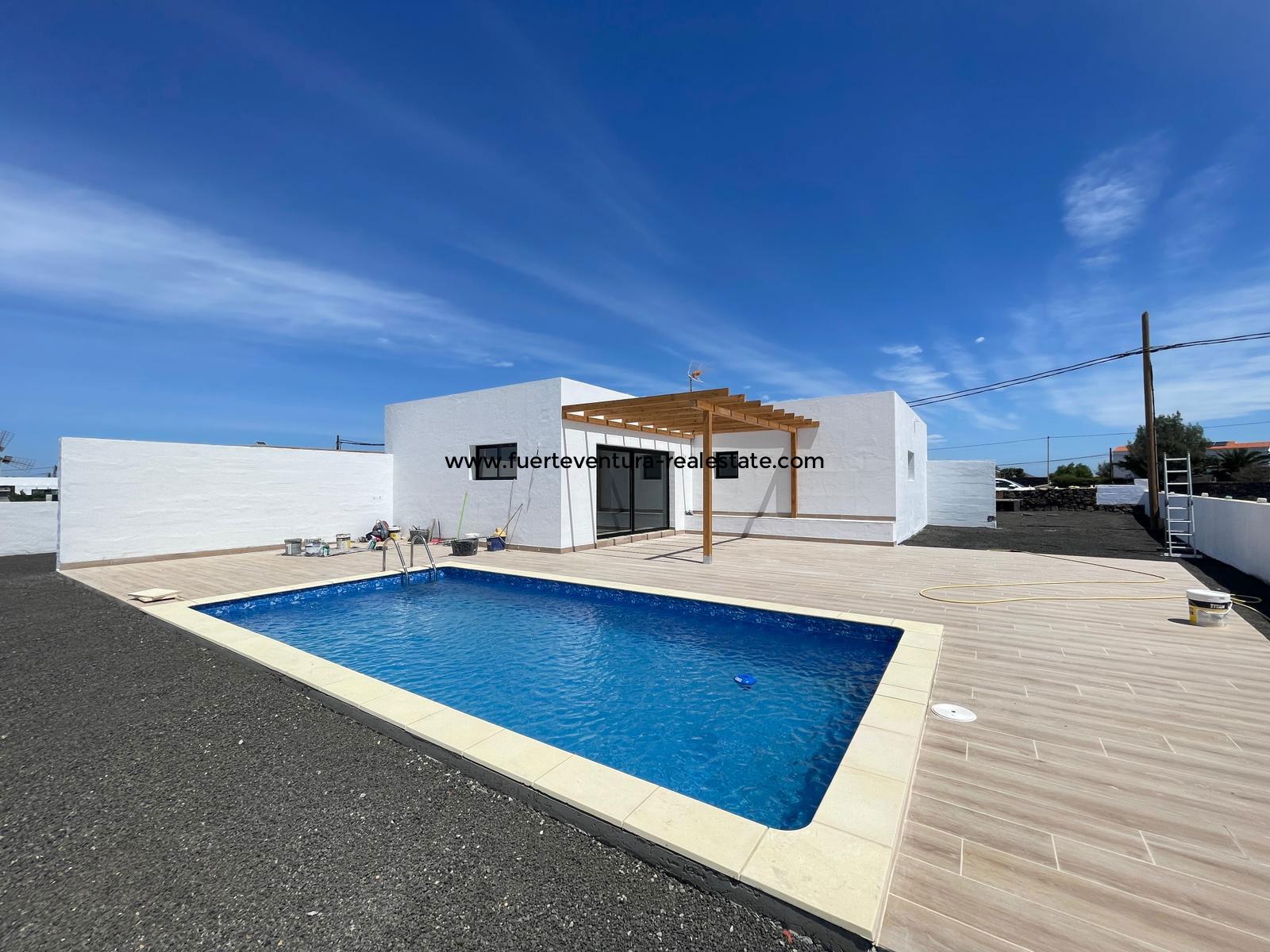 A modern new build villa with pool is for sale in Lajares